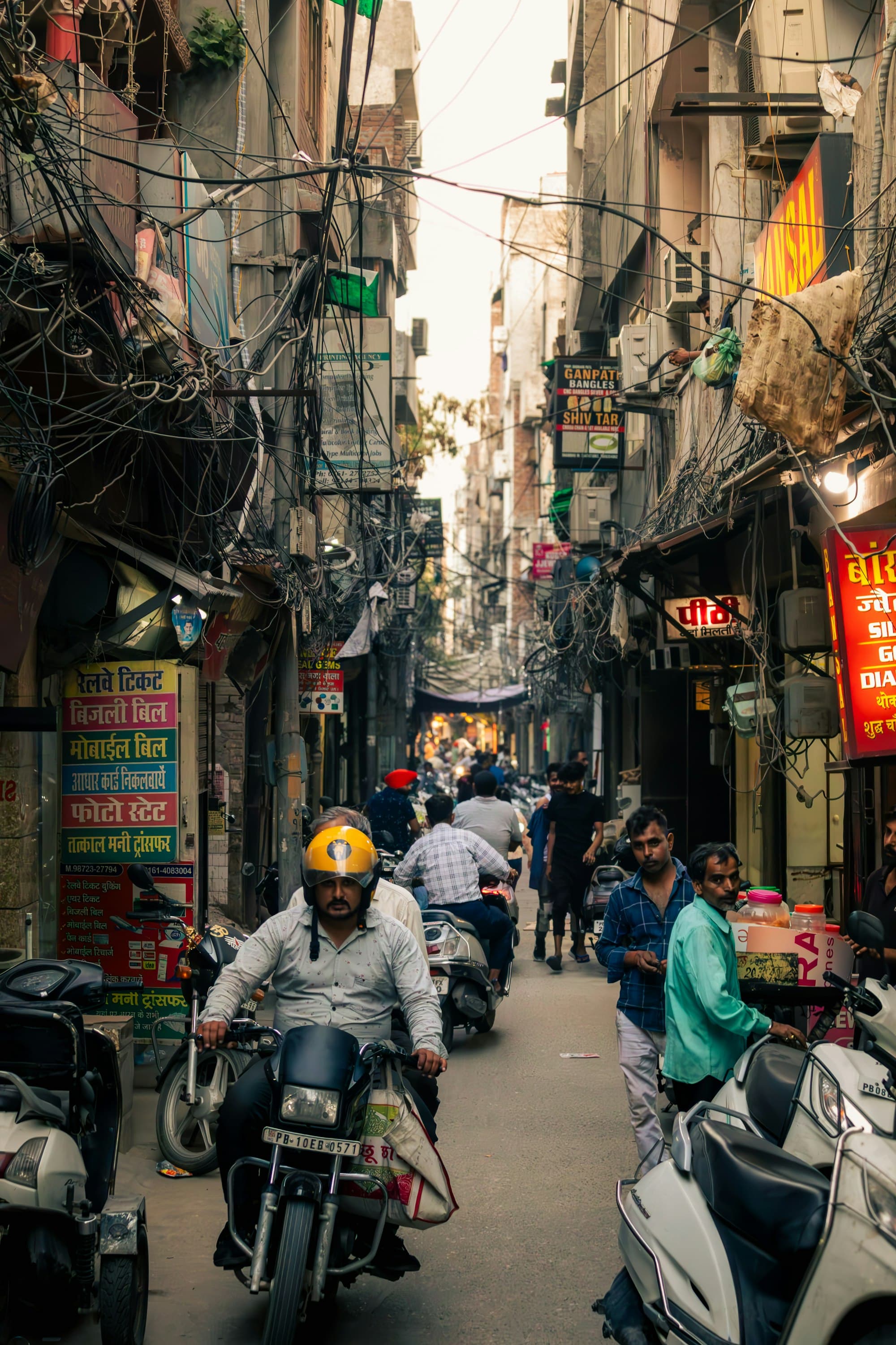 Riders on a narrow neighbourhood street